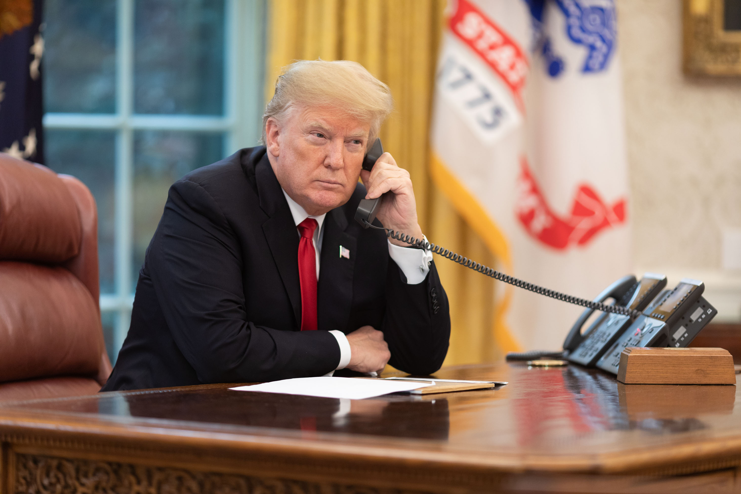 Withdrawing from the Trans-Pacific Partnership (TPP) and renegotiating NAFTA into the
              USMCA.